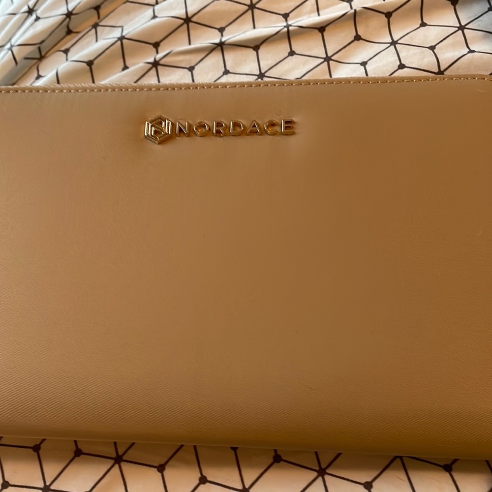 Nordace travel wallet. Canvas, tan, never used.